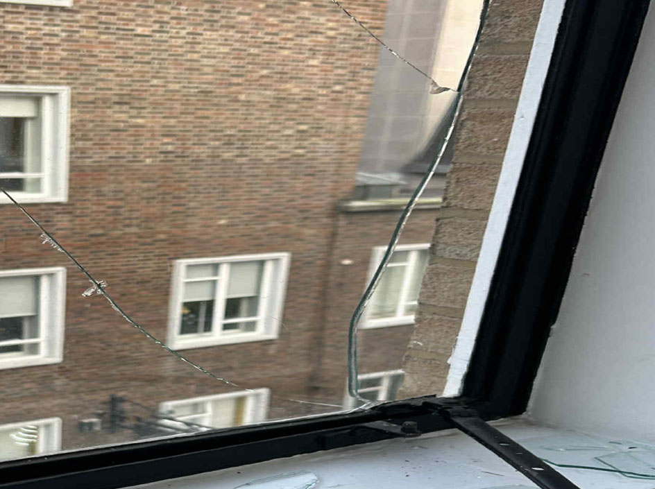 Emergency glazier repairing glass